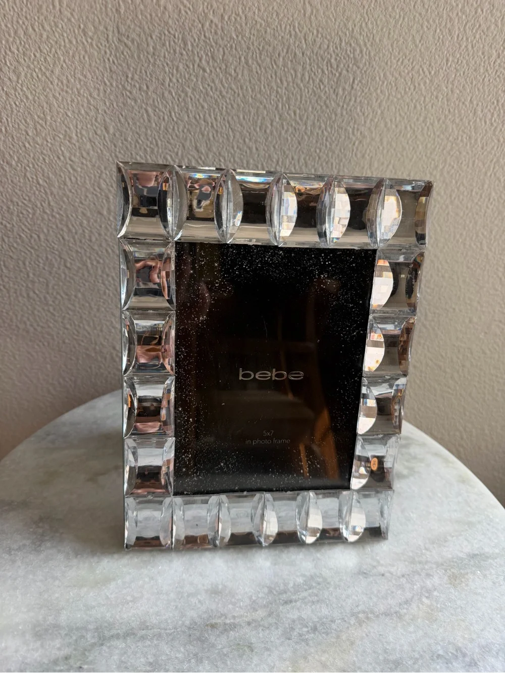 bebe silver tone